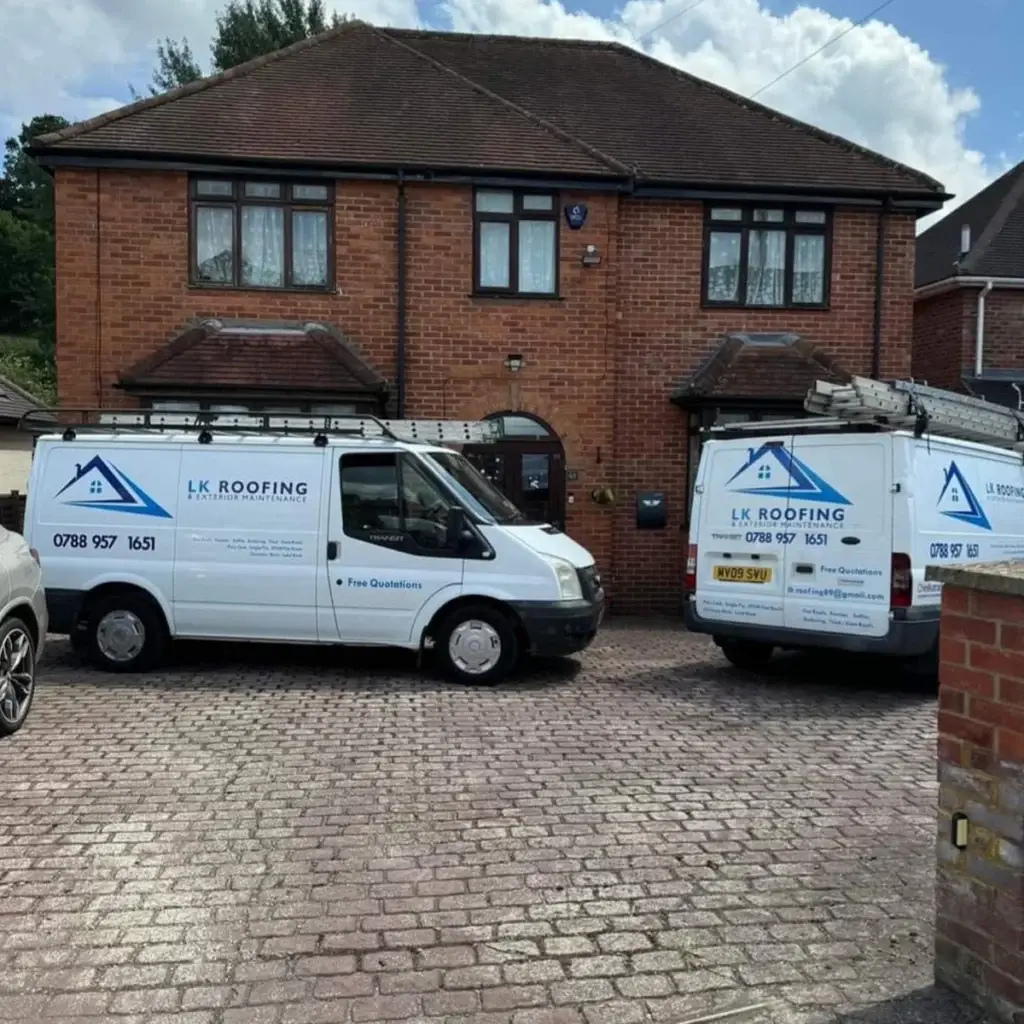 LK Roofing Vans outside a property where roofing and maintenance services are being carried out
