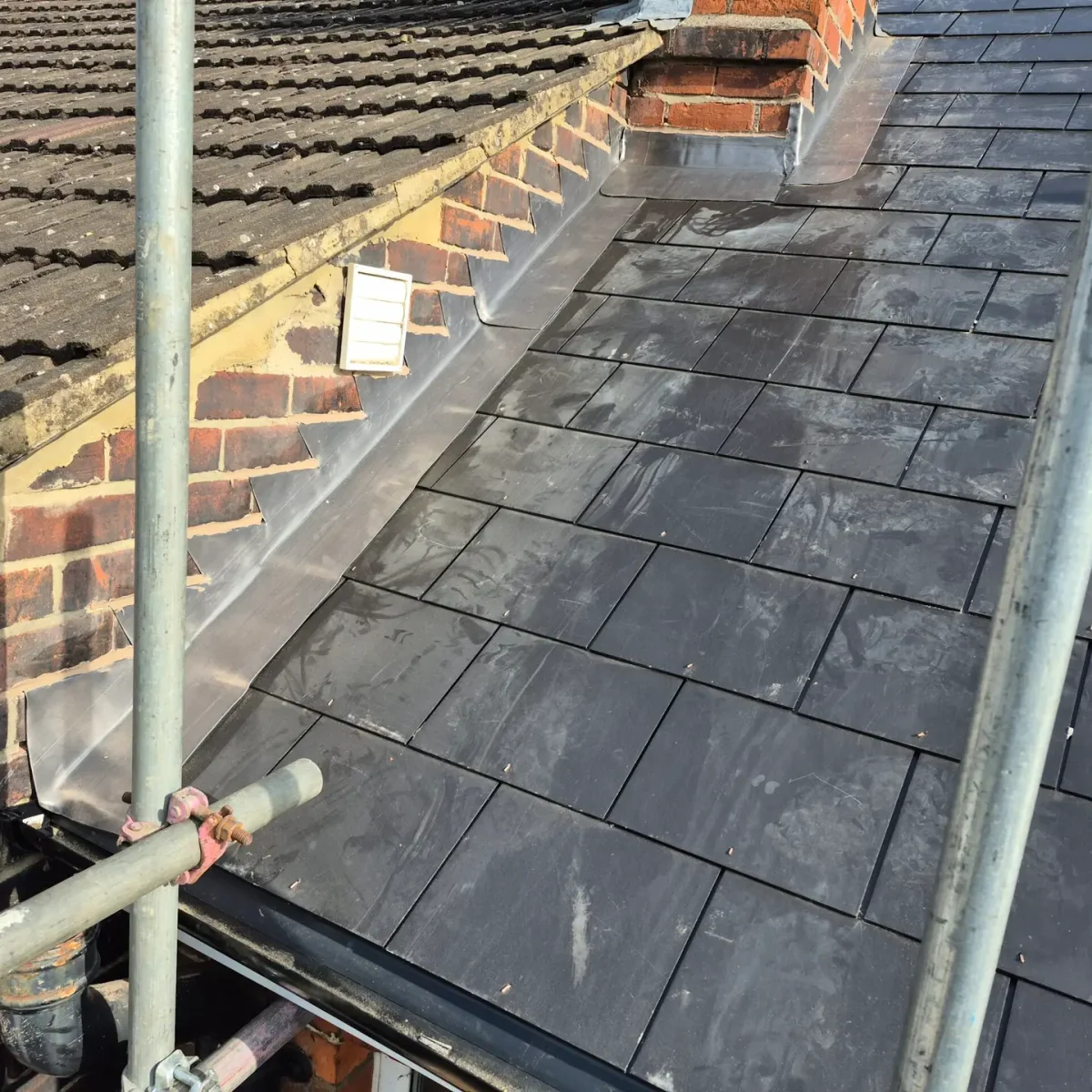 Cleaning an old roof LK Roofing