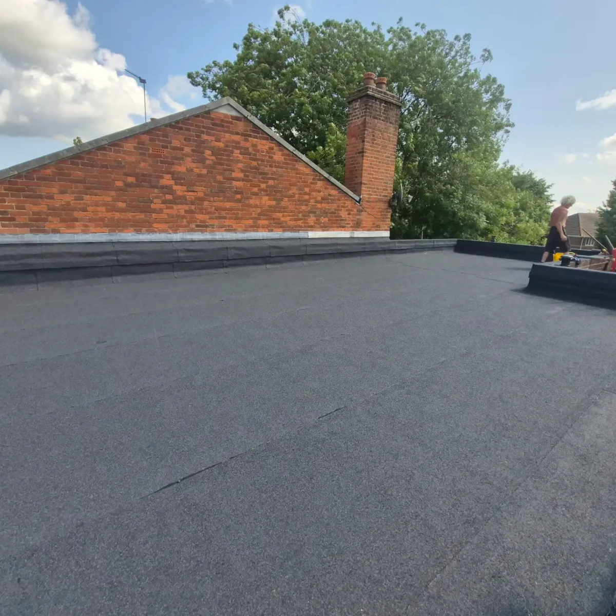Flat roof service carried out by LK Roofing & Maintenance Services